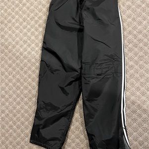 Ski/snow pants black with white stripe down legs. Size XL 14-16